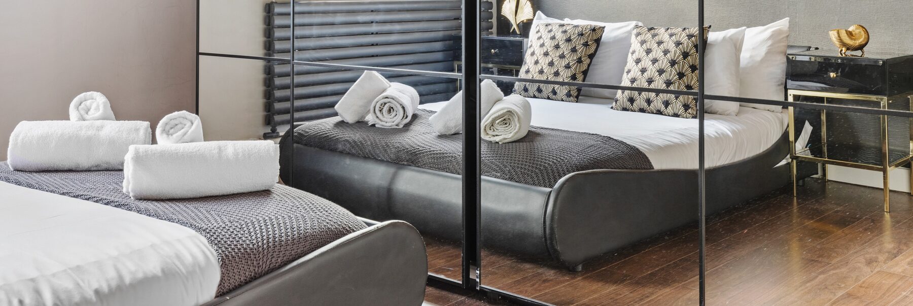 Beds dressed and staged for short stay guests